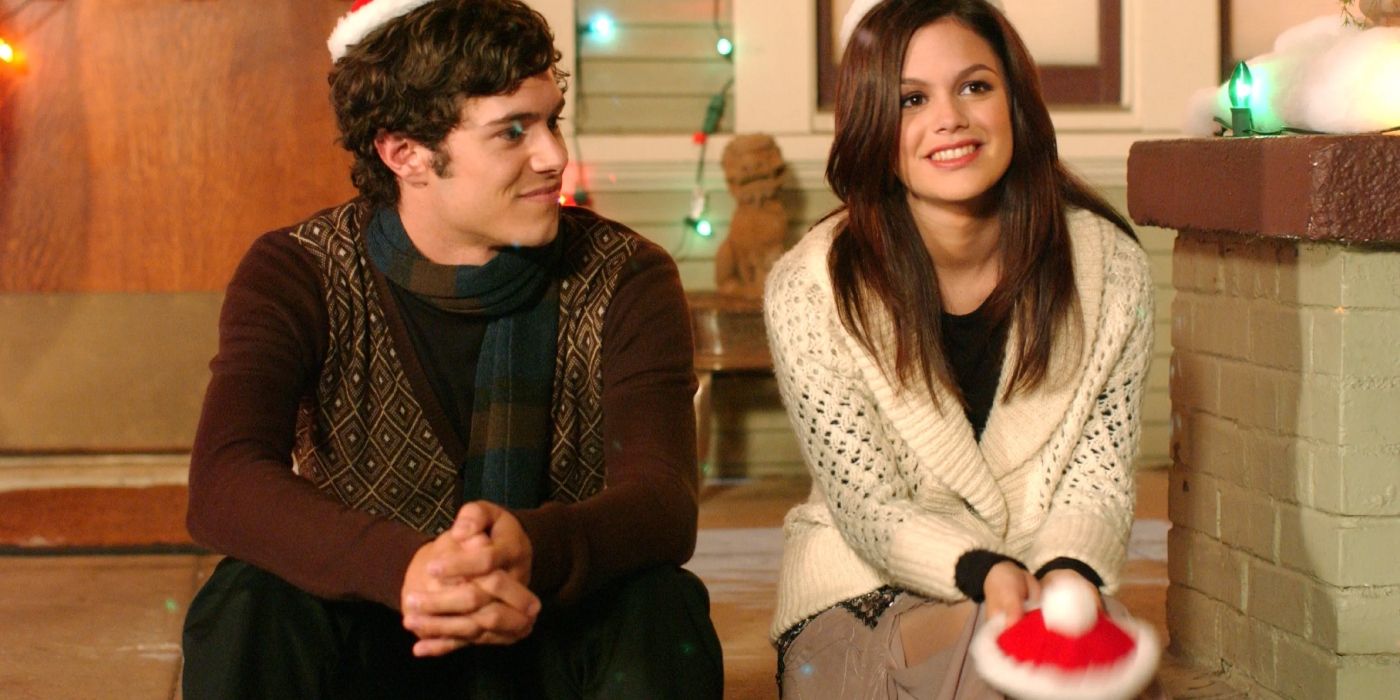 Seth Cohen and Summer Roberts dressed up for Christmas and sitting together on The O.C.
