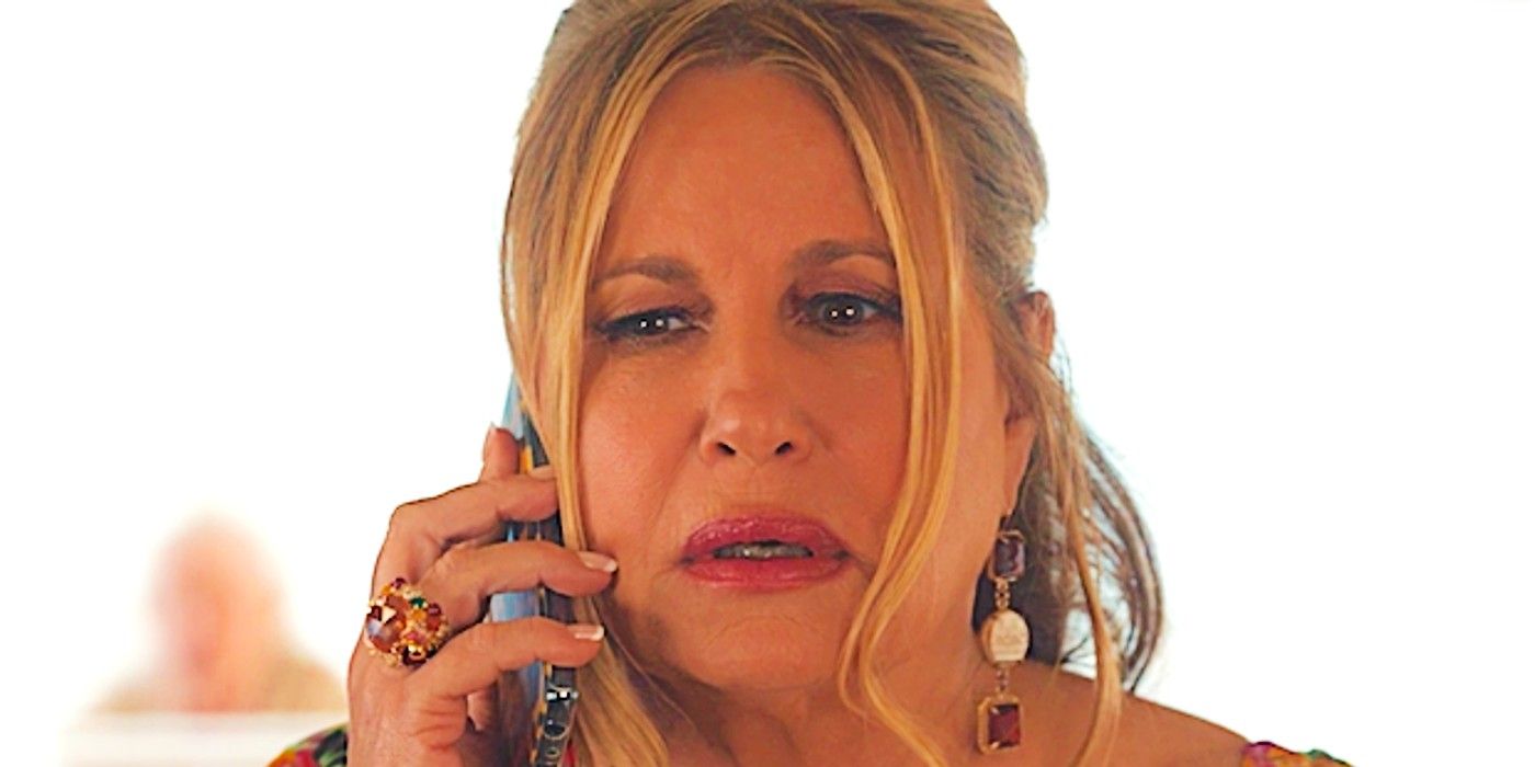 Tanya on the phone looking shocked in The White Lotus season 2