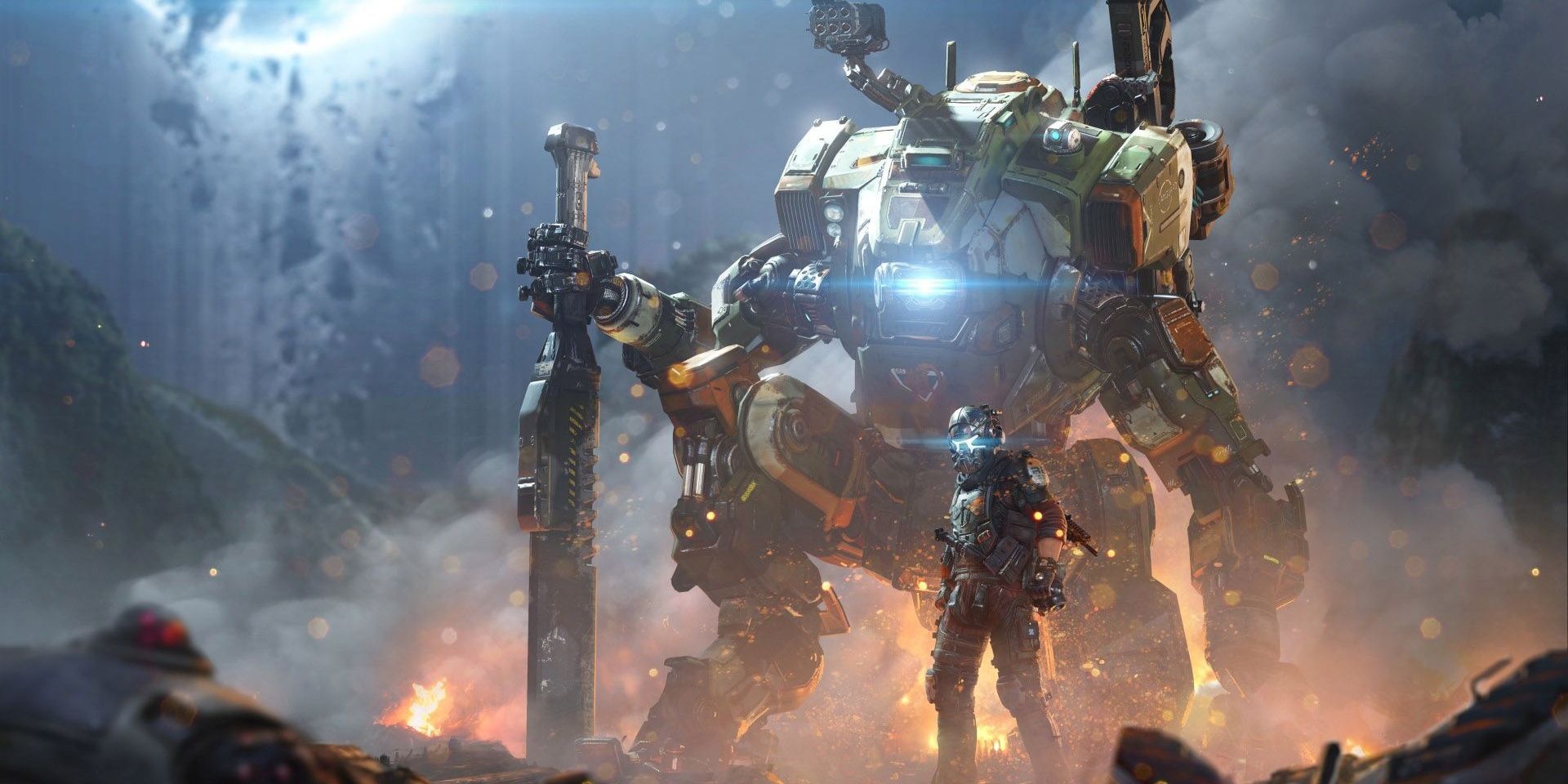 BT, the protagonist's mech from Titanfall 2, stands behind Jack Cooper in a cave, surrounded by flames.