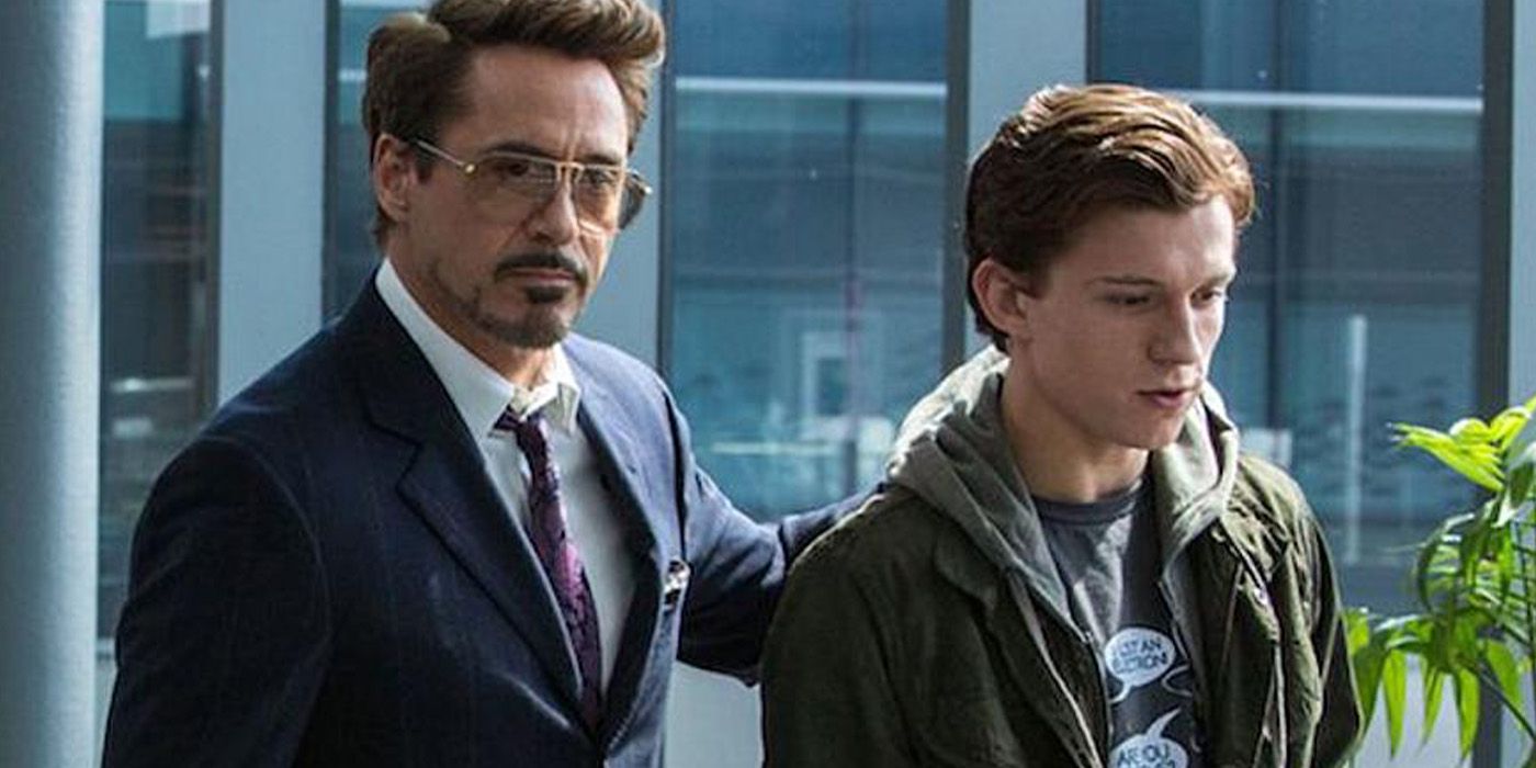 Robert Downey Jr.'s Tony Stark with his hand on the shoulder of Tom Holland's Peter Parker in Spider-Man: Homecoming