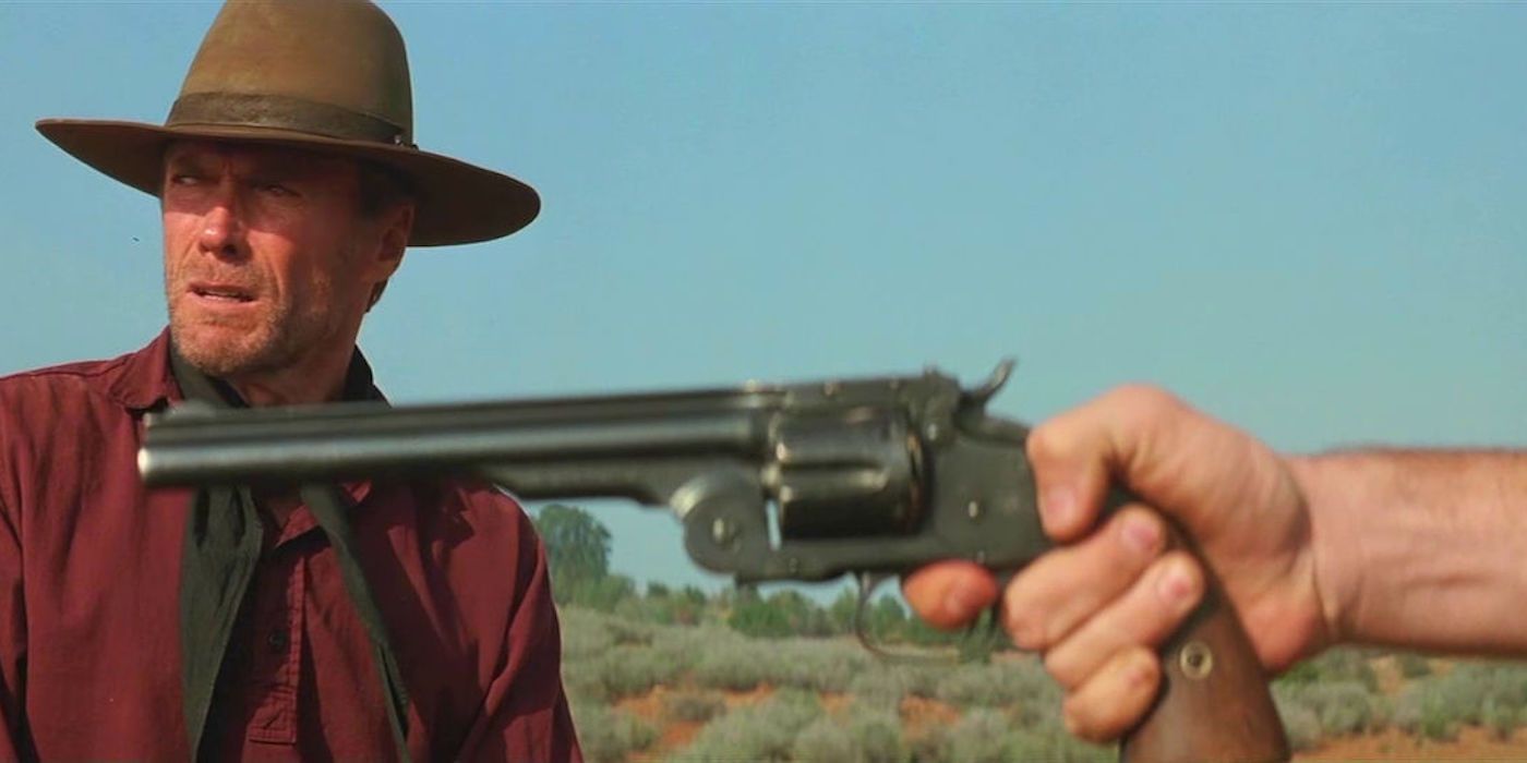 A Schofield revolver being held near Clint Eastwood in Unforgiven
