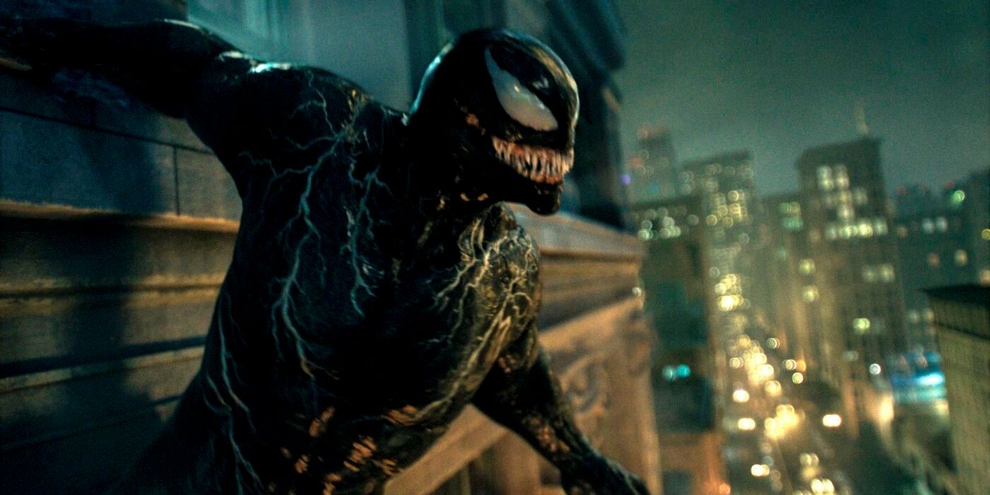 Venom leaning against a building in Let There Be Carnage.