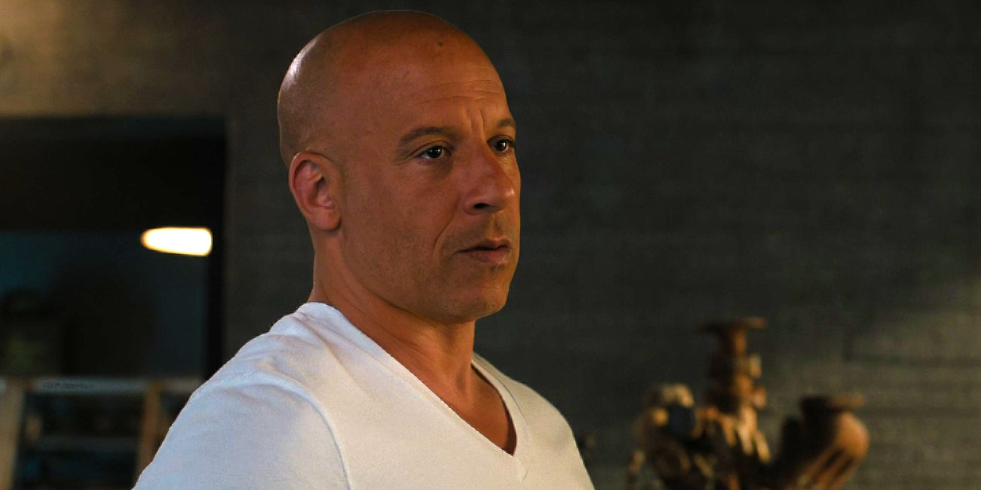 Vin Diesel as Dom Toretto wearing white shirt in F9