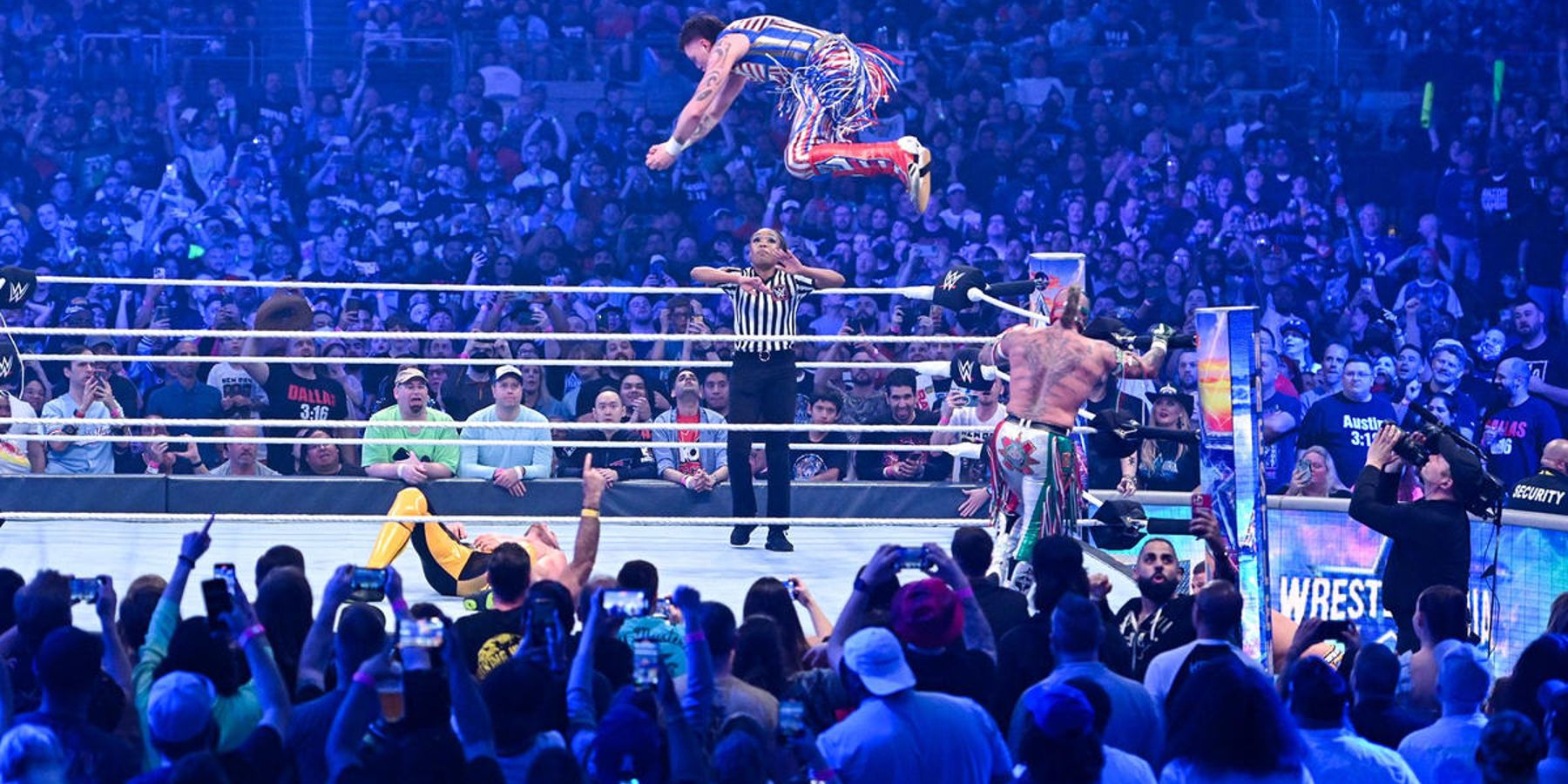Dominik Mysterio hits Logan Paul with a frog splash during WrestleMania 38. Vince McMahon is reportedly plotting to sell the company in 2023.