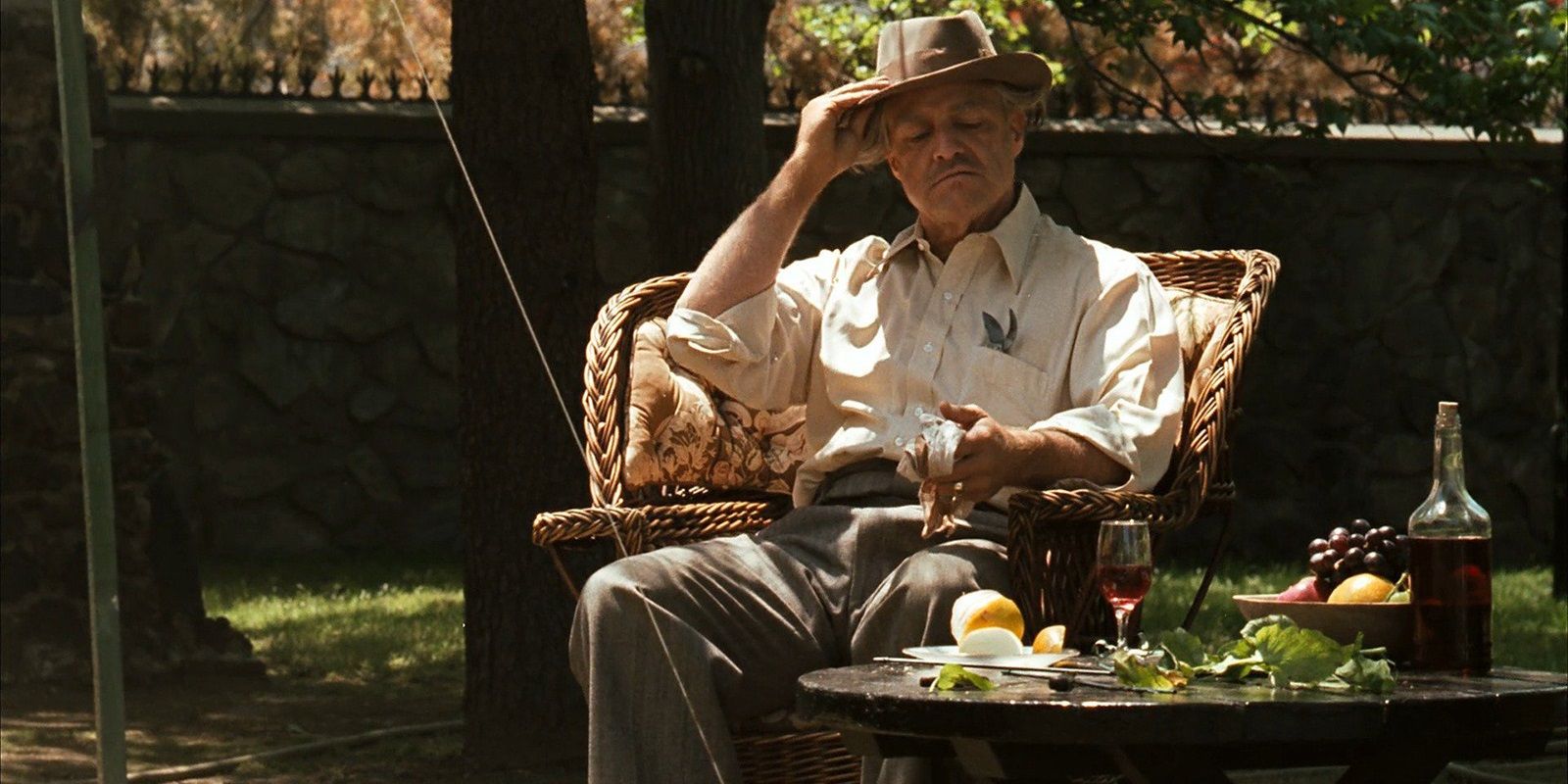 Vito sitting in a garden in The Godfather