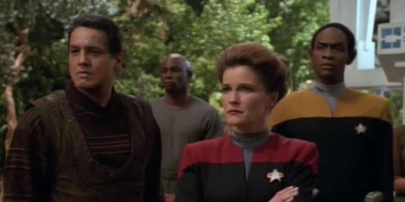 Chakotay, Janeway, and Tuvok look on in Voyager 