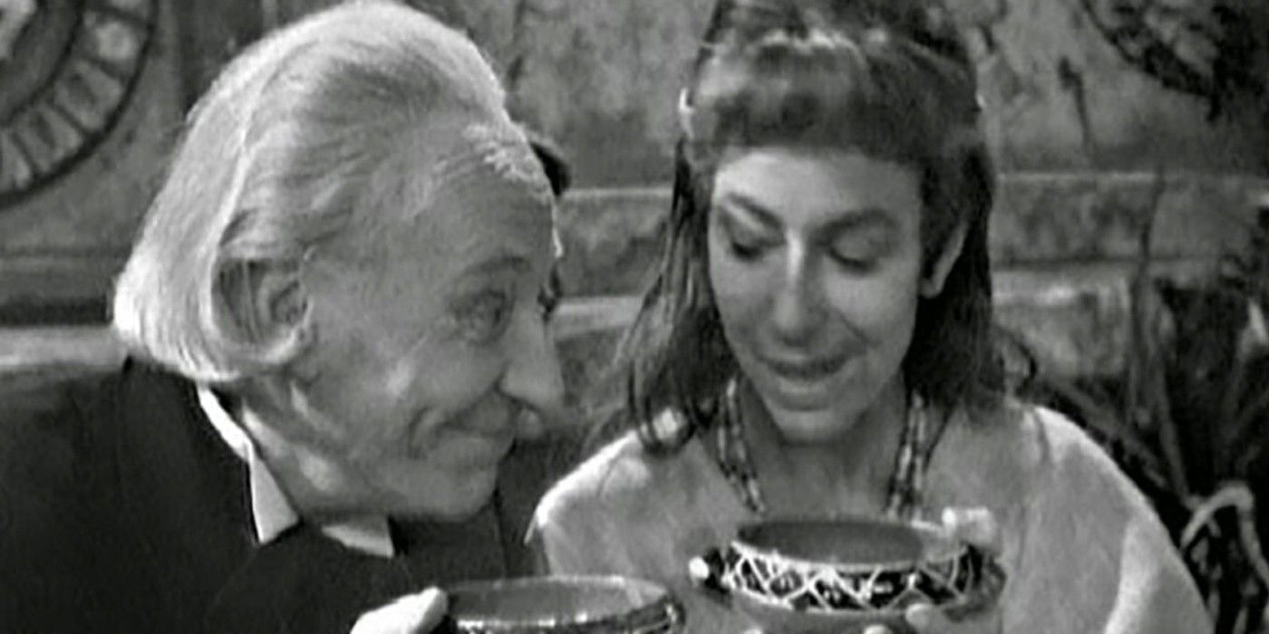 William Hartnell as the First Doctor and Cameca drinking cocoa in Doctor Who