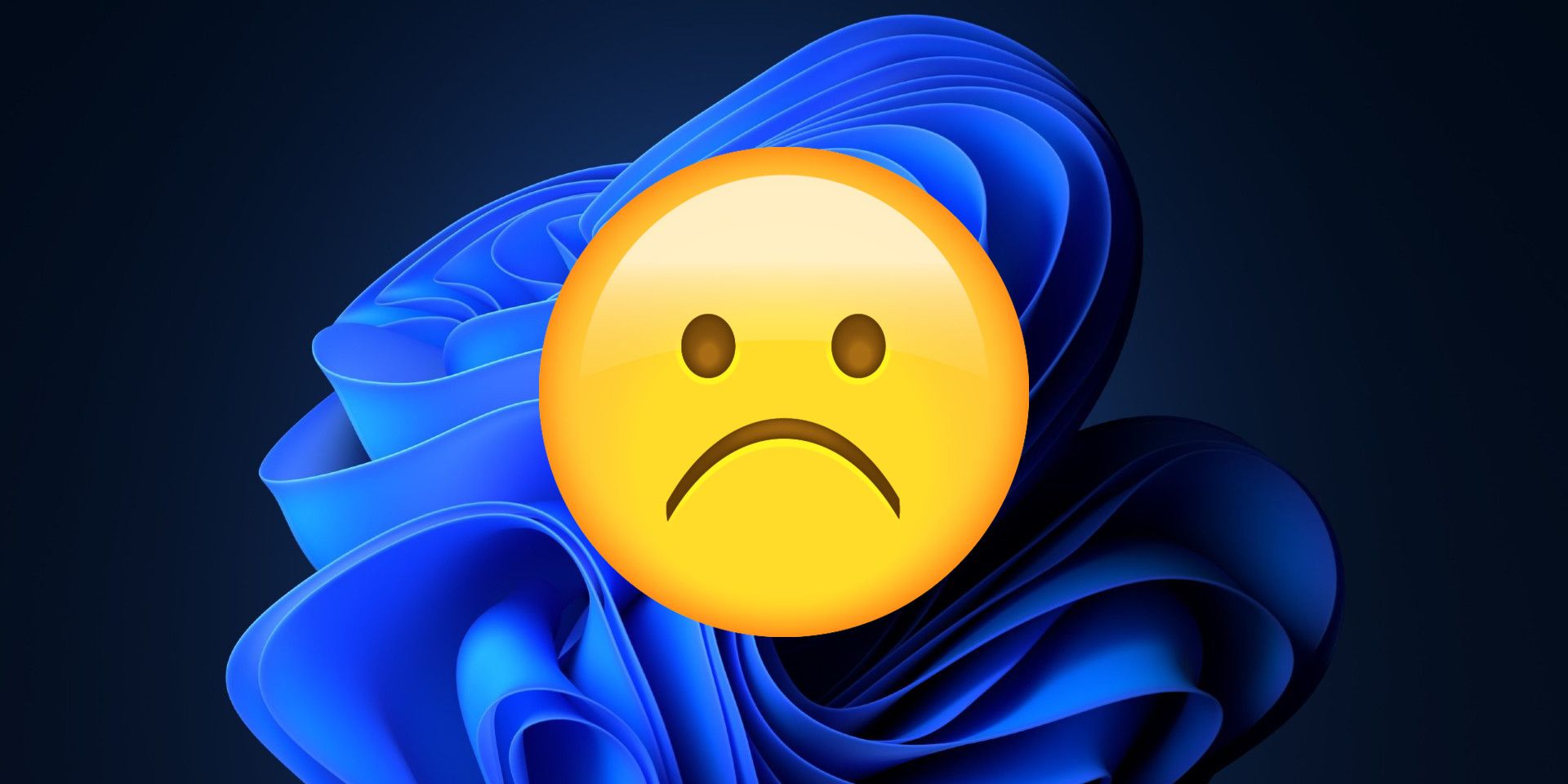Windows 11 default blue ribbon wallpaper with yellow sad face emoji superimposed