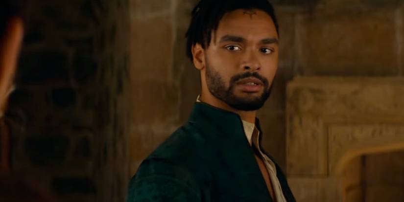 Regé-Jean Page as Xenk the Paladin looking serious and wearing a green jacket in Dungeons & Dragons: Honor Among Thieves.