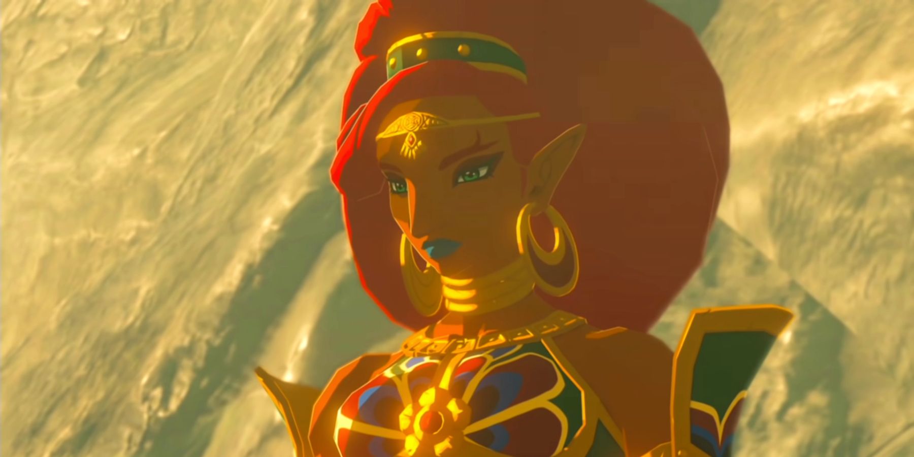 Gerudo Champion Urbosa from Breath of the Wild, seen standing in front of a stone cliff face in one of the game's Memories cutscenes.