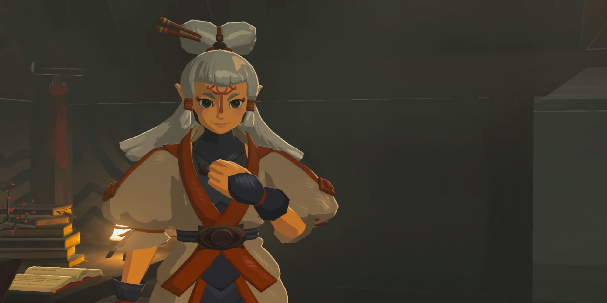 Paya from The Legend of Zelda: Breath of the Wild stands with a fist to her chest.