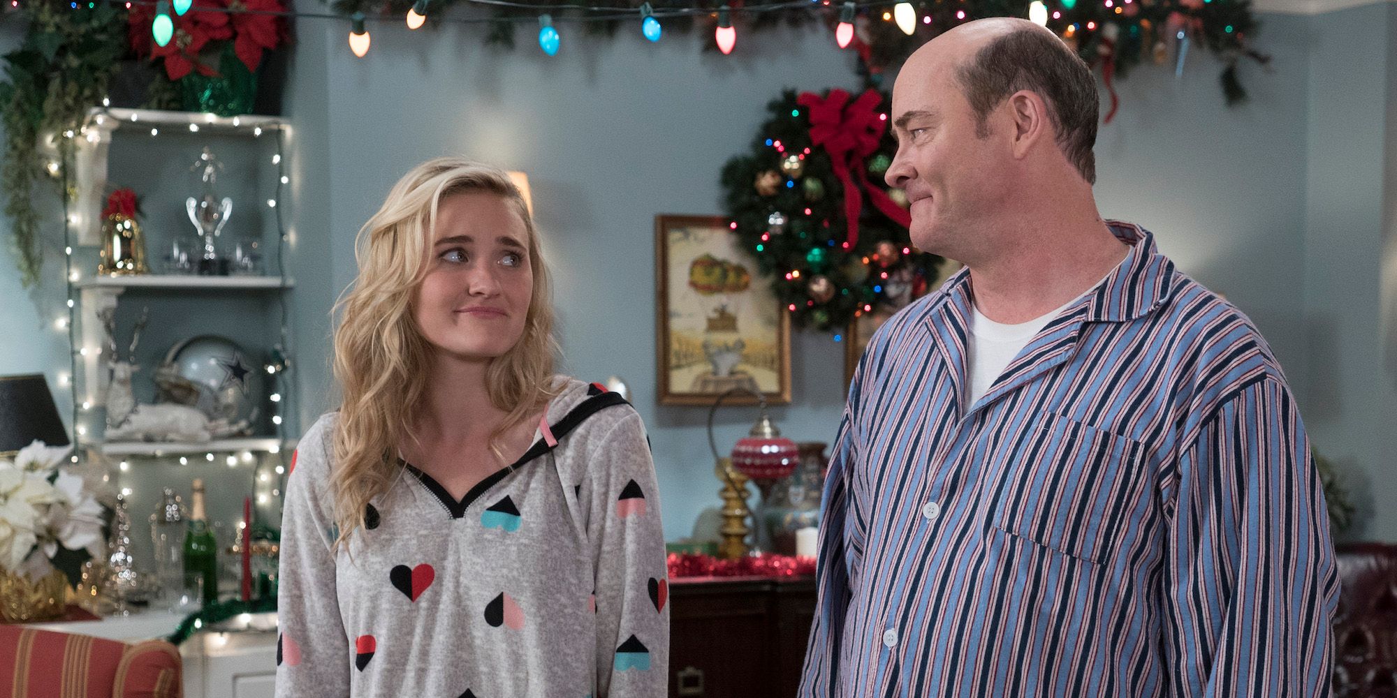 AJ Michalka as Lainey Lewis and David Koechner as Bill Lewis on The Goldbergs at Christmas