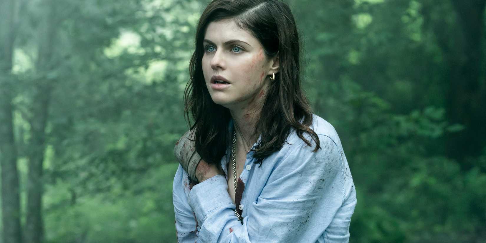 Alexandra Daddario as Rowan Mayfair in the woods in Mayfair Witches.