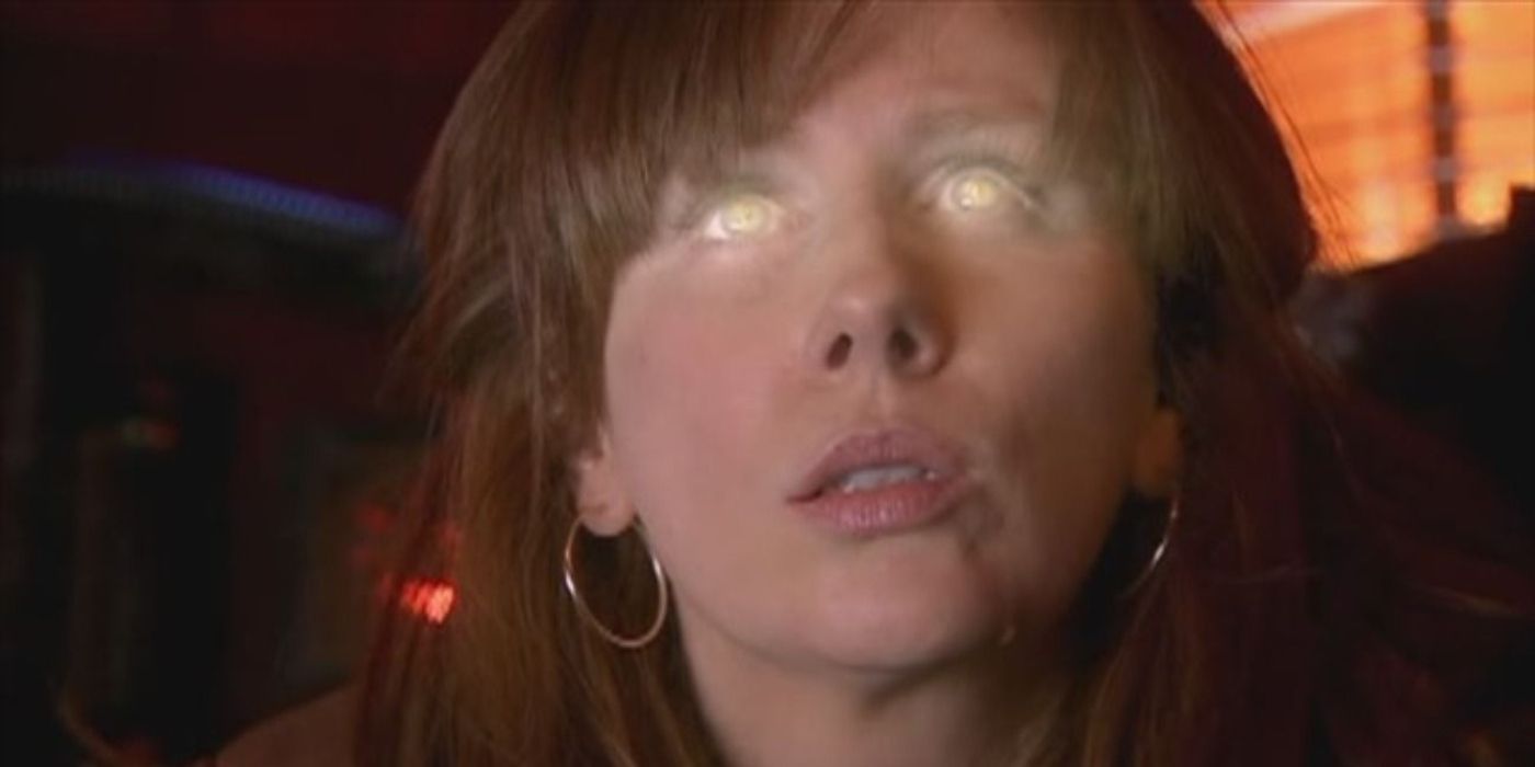An image of Donna staring at the ceiling with eyes glowing in Doctor Who