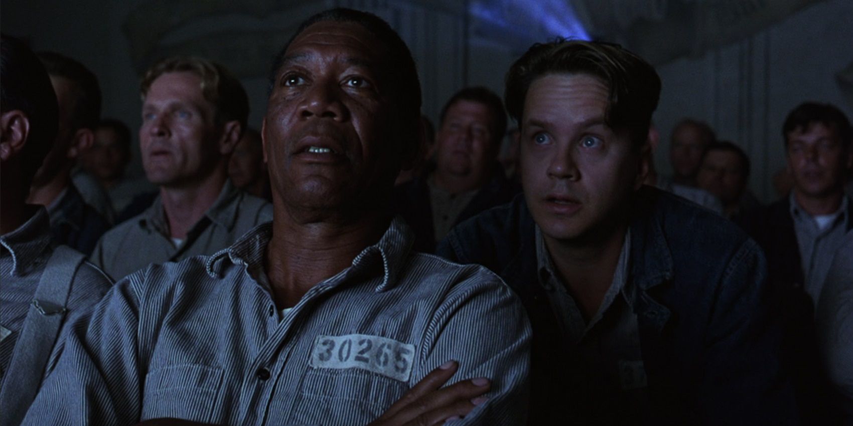 Andy and Red watching a movie in The Shawshank Redemption