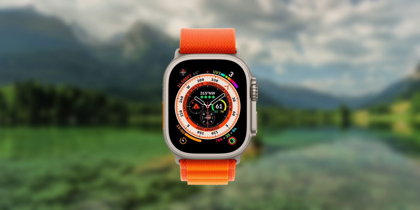 Apple Watch Ultra with a blurred mountainous valley in the background
