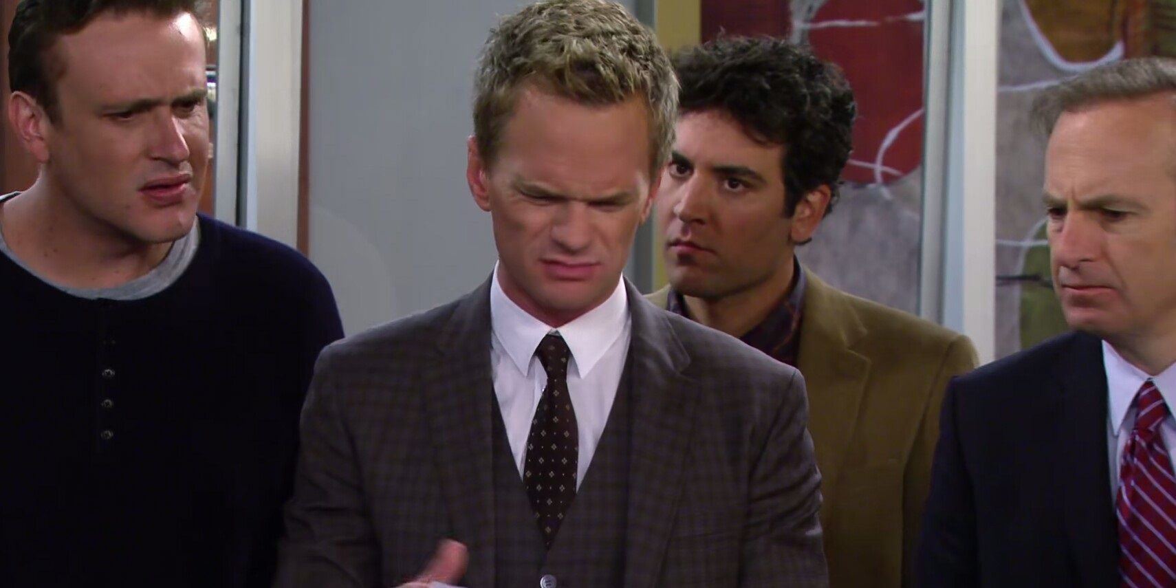 Barney_Ted_Marshall_and_Arthur_in_a_conference_room_in_How_I_Met_Your_Mother