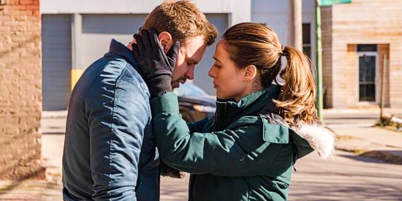 Kim Burgess (Marina Squerciati) comforting Adam Ruzek (Patrick John Flueger) in Chicago PD
