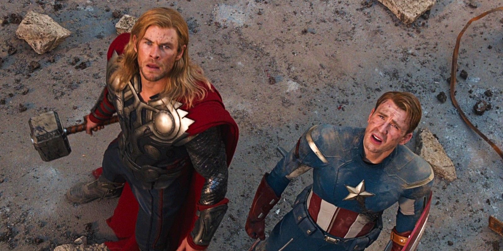 Chris Hemsworth as Thor and Chris Evans as Captain America among the rubble of the Battle of New York in The Avengers