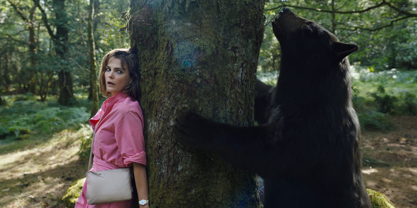 Keri Russell as Sari, hiding from the bear in Cocaine Bear