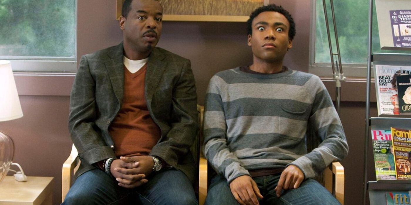 Levar Burton and Troy Barnes sitting in chairs on Community