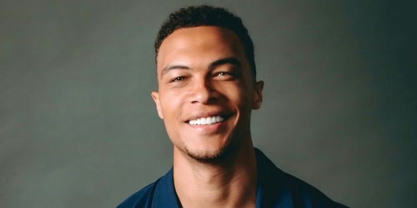 Dale Moss smiling against a gray background from The Bachelorette