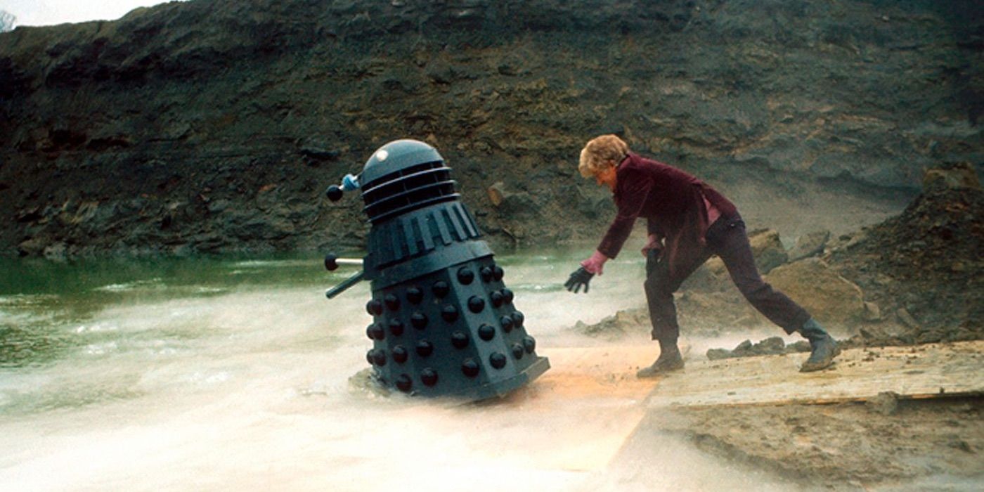 The Doctor pushes a Dalek into the water from Doctor Who