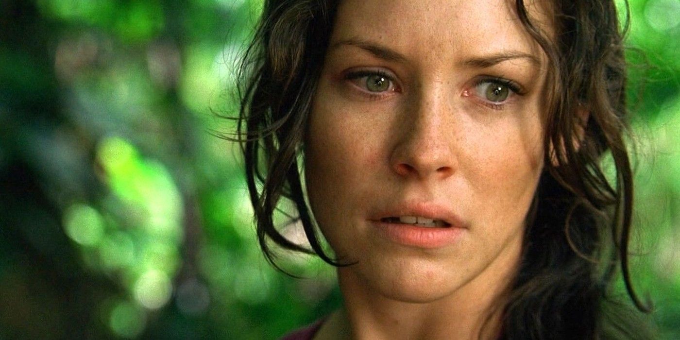 Evangeline Lilly como Kate na selva em Lost, com uma expressão assombrada no rosto