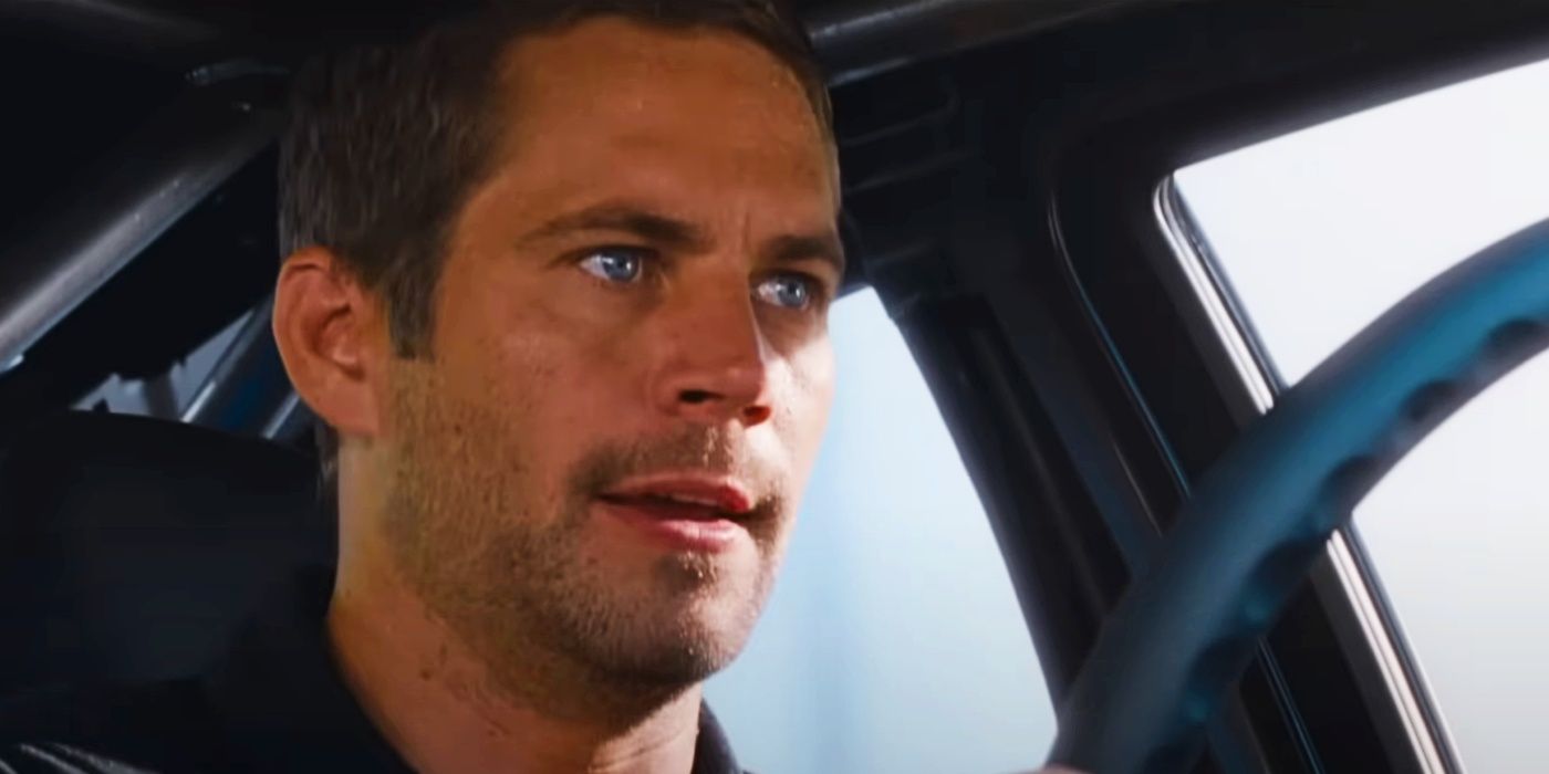 Paul Walker as Brian behind the wheel of a car in the Fast X trailer.