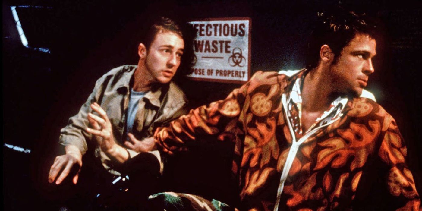 The Narrator and Tyler Durden sneak around a dumpster in Fight Club