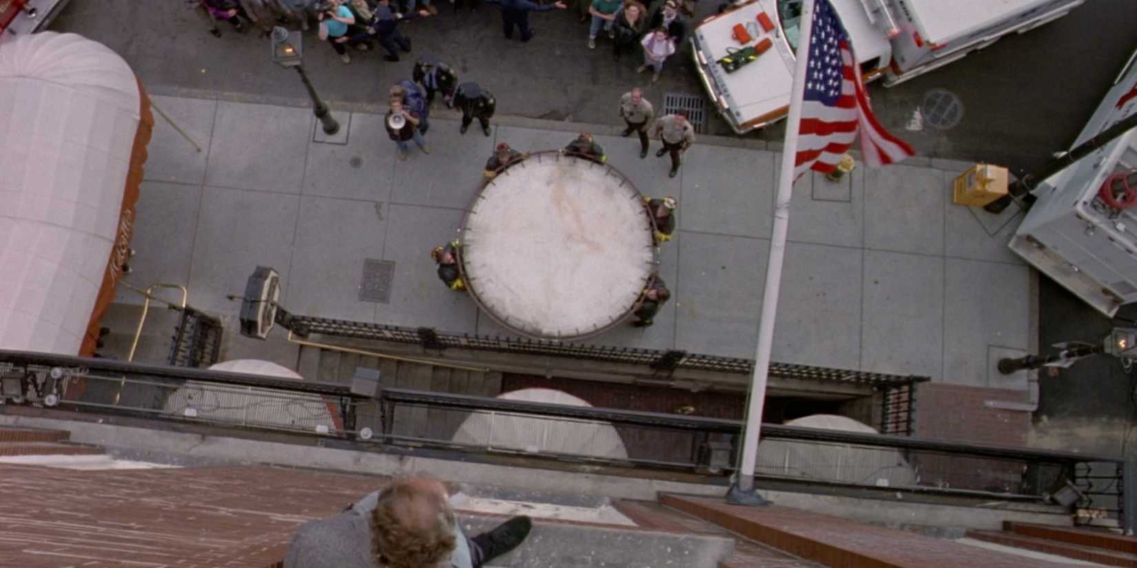 Frasier stood on the edge of a building looking down at a trampoline in the Cheers episode "The Girl in the Plastic Bubble."