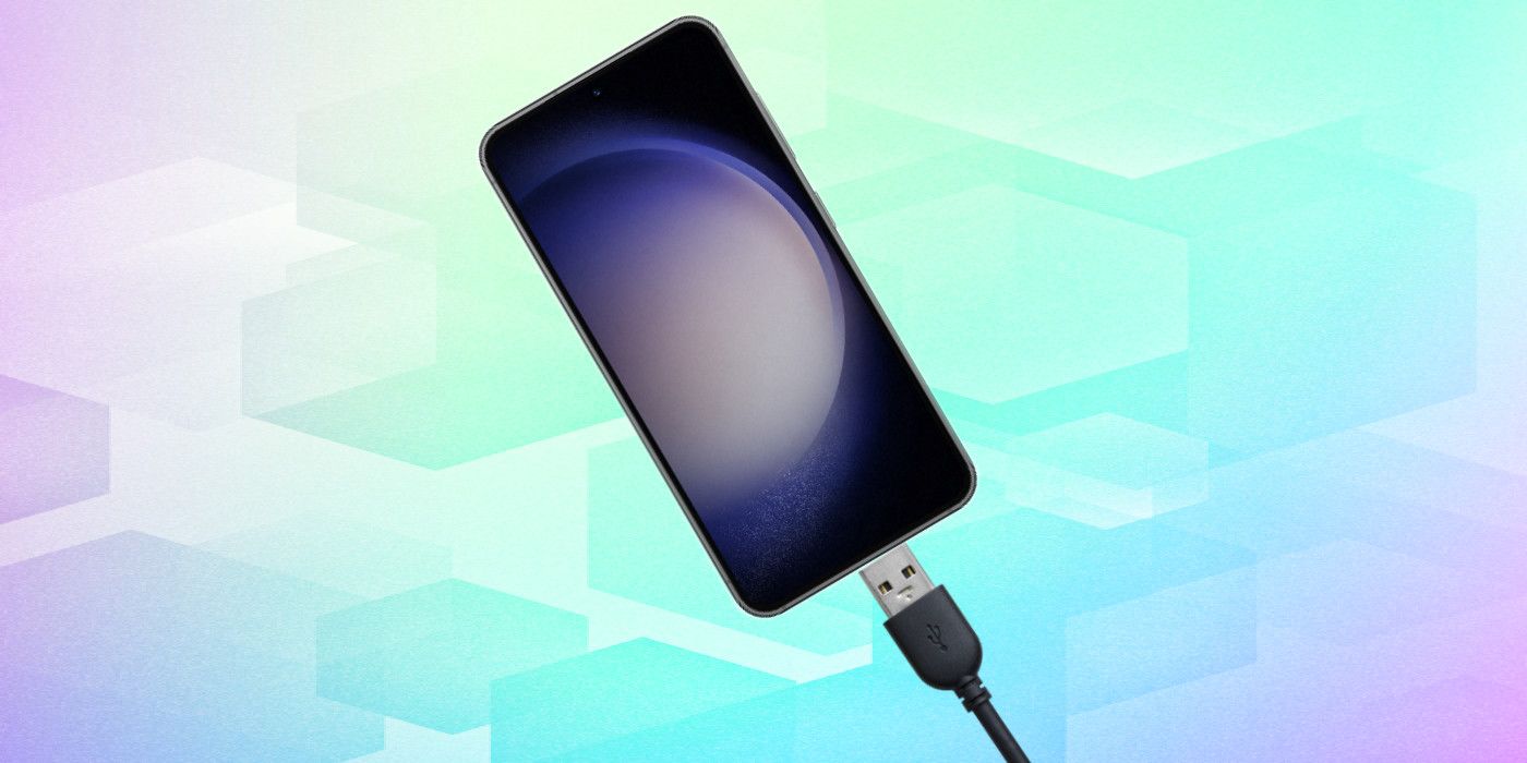 Samsung Galaxy S23 with a charging cable on custom gradient background