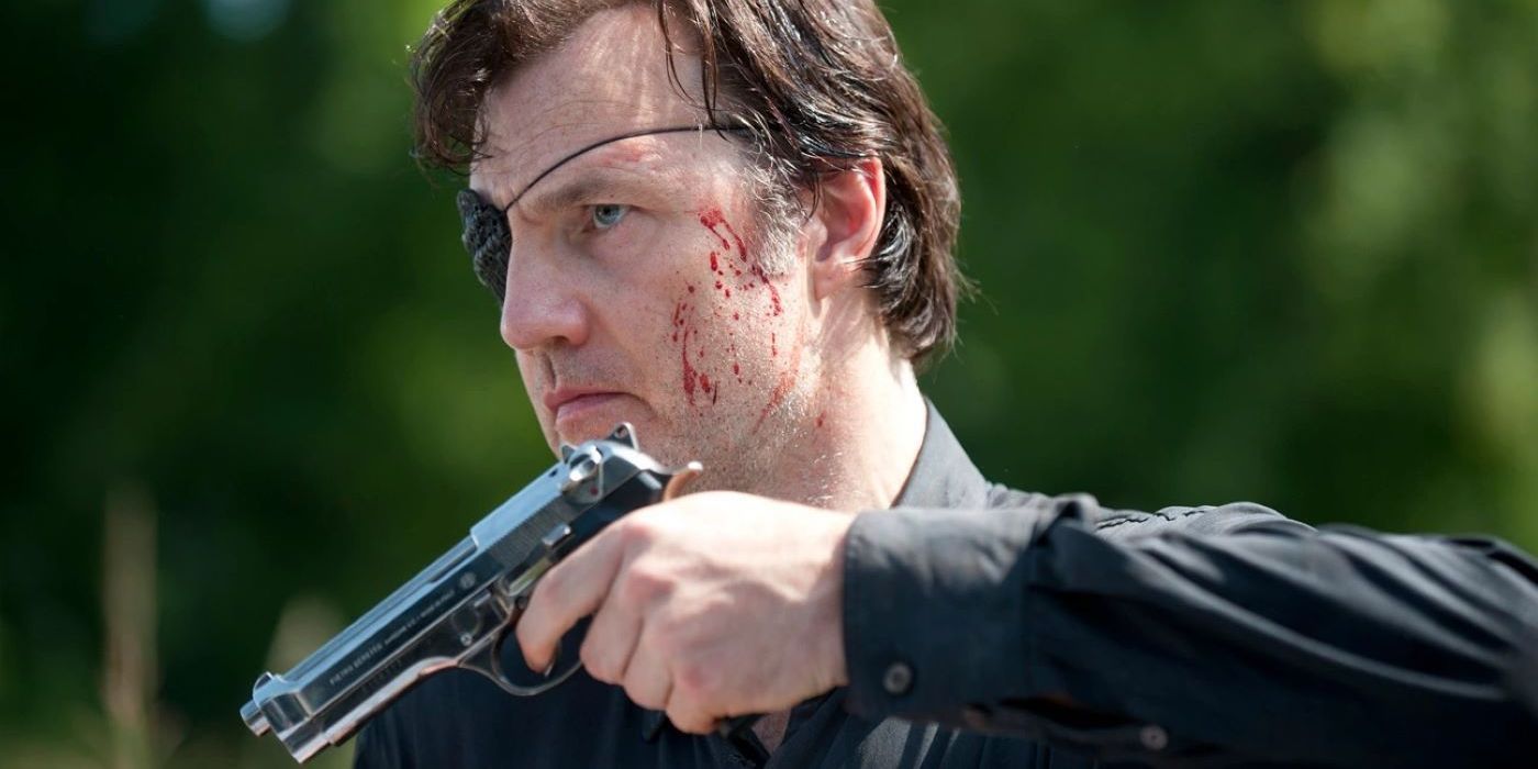 O Governador (David Morrisey) apontando uma arma em The Walking Dead