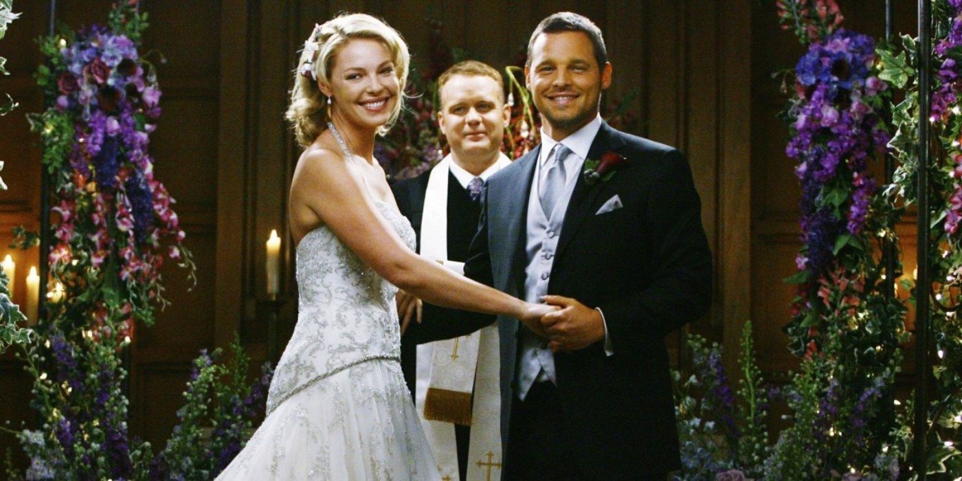 Izzie and Alex smiling on their wedding day on Grey's Anatomy