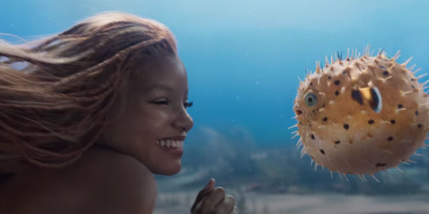 Halle Bailey smiling at Flounder in The Little Mermaid