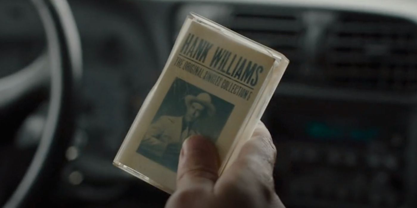 Joel holding a cassette tape of Hank Williams' Alone and Forsaken in Last of Us episode 4