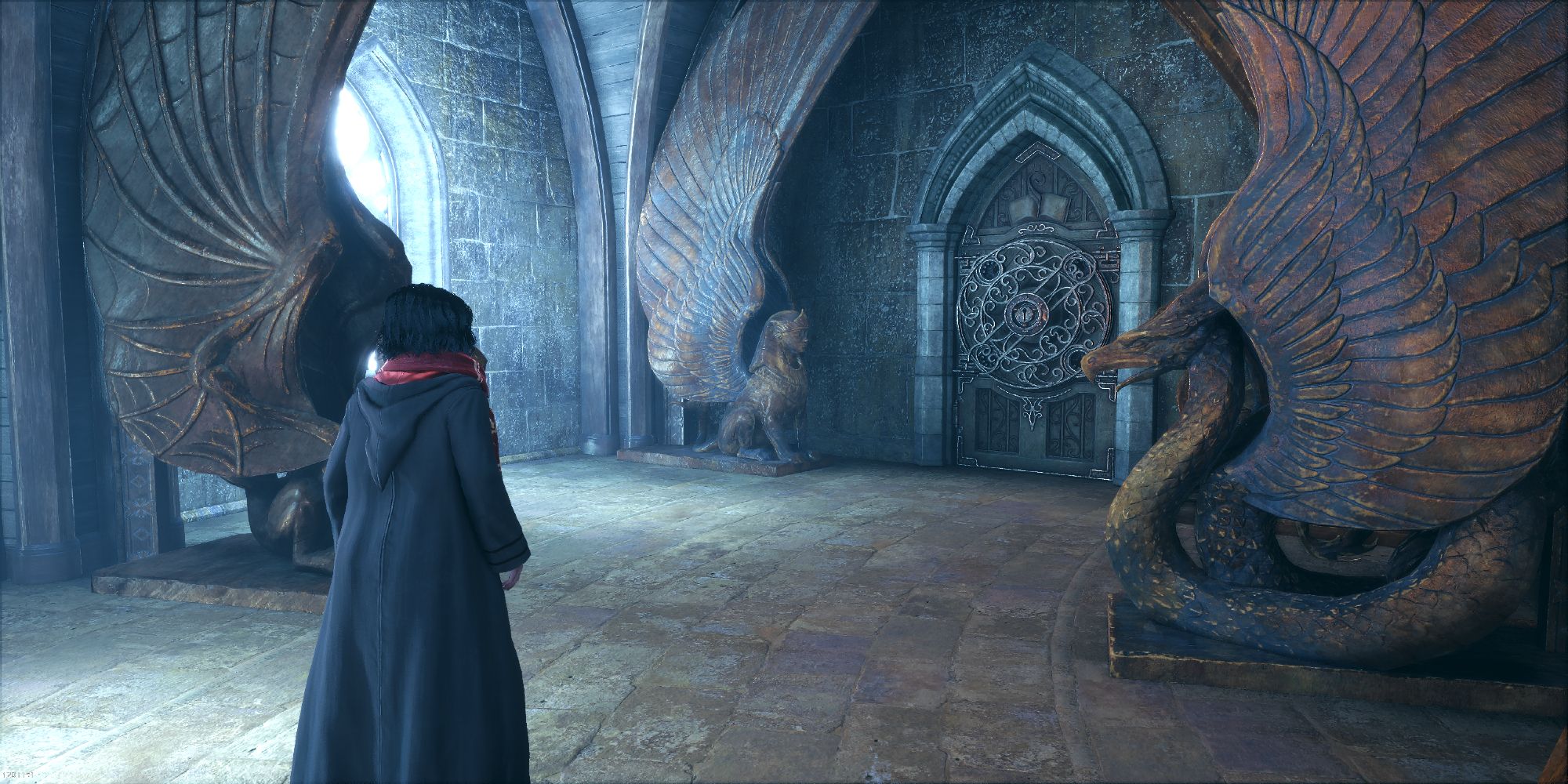 A player in Gryffindor robes approaching the complex locked door that guards the Book of Admittance chamber.