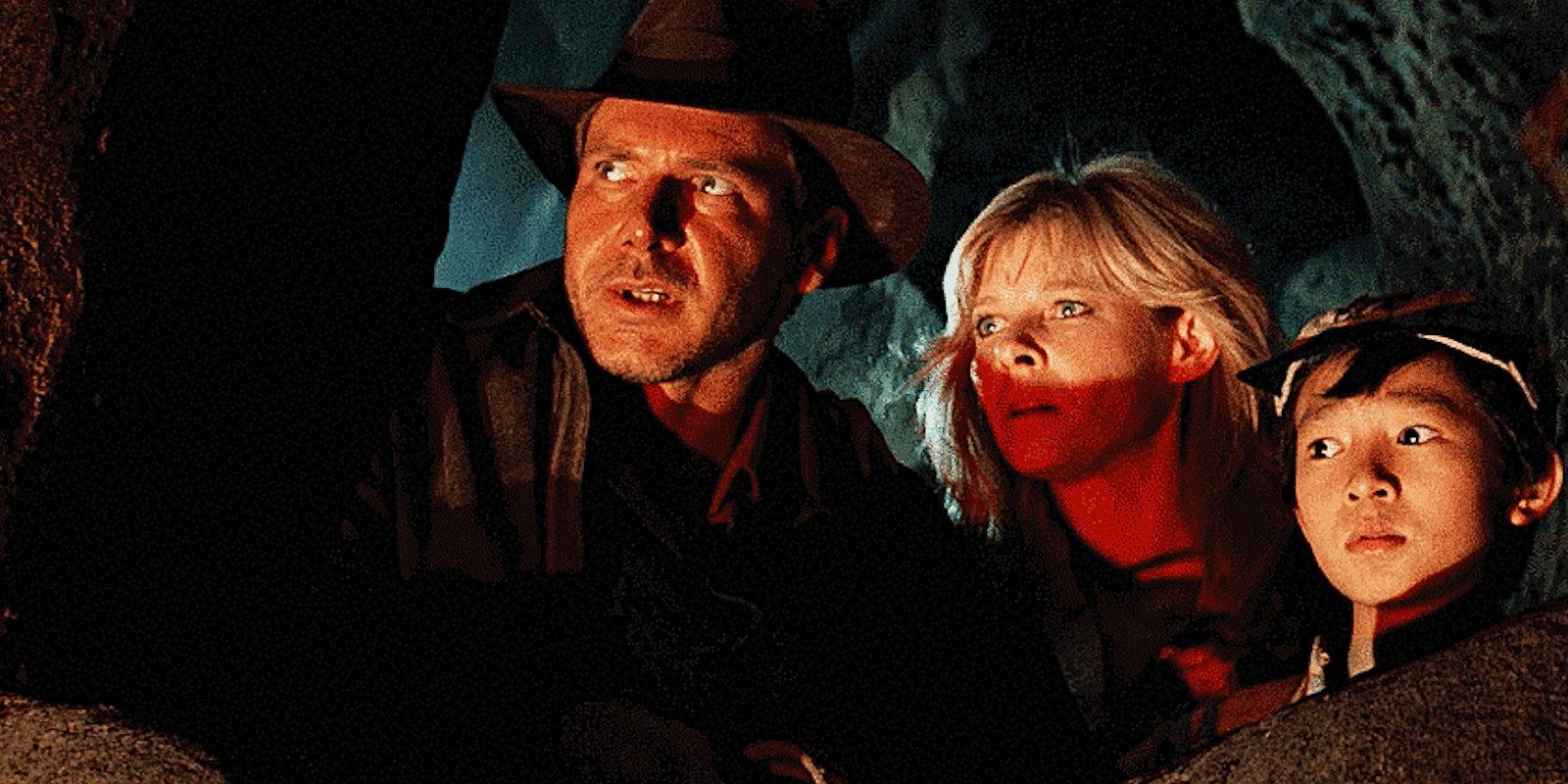 Indy, Willie, and Short Round underground in Indiana Jones and the Temple of Doom