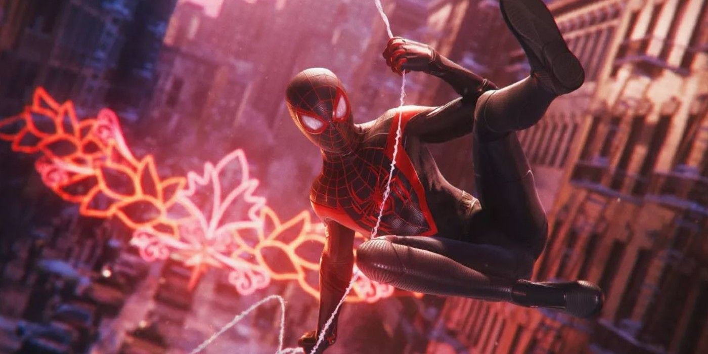 Miles Morales in his Insomniac Games suit swinging through the streets of New York. A neon holiday sign hangs over a busy street behind him.