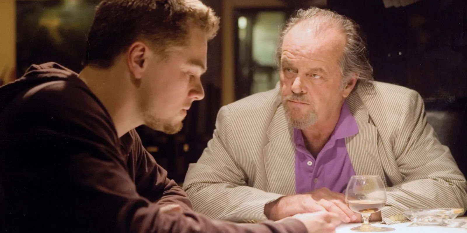 Jack Nicholson and Leonardo DiCaprio in a back room in The Departed