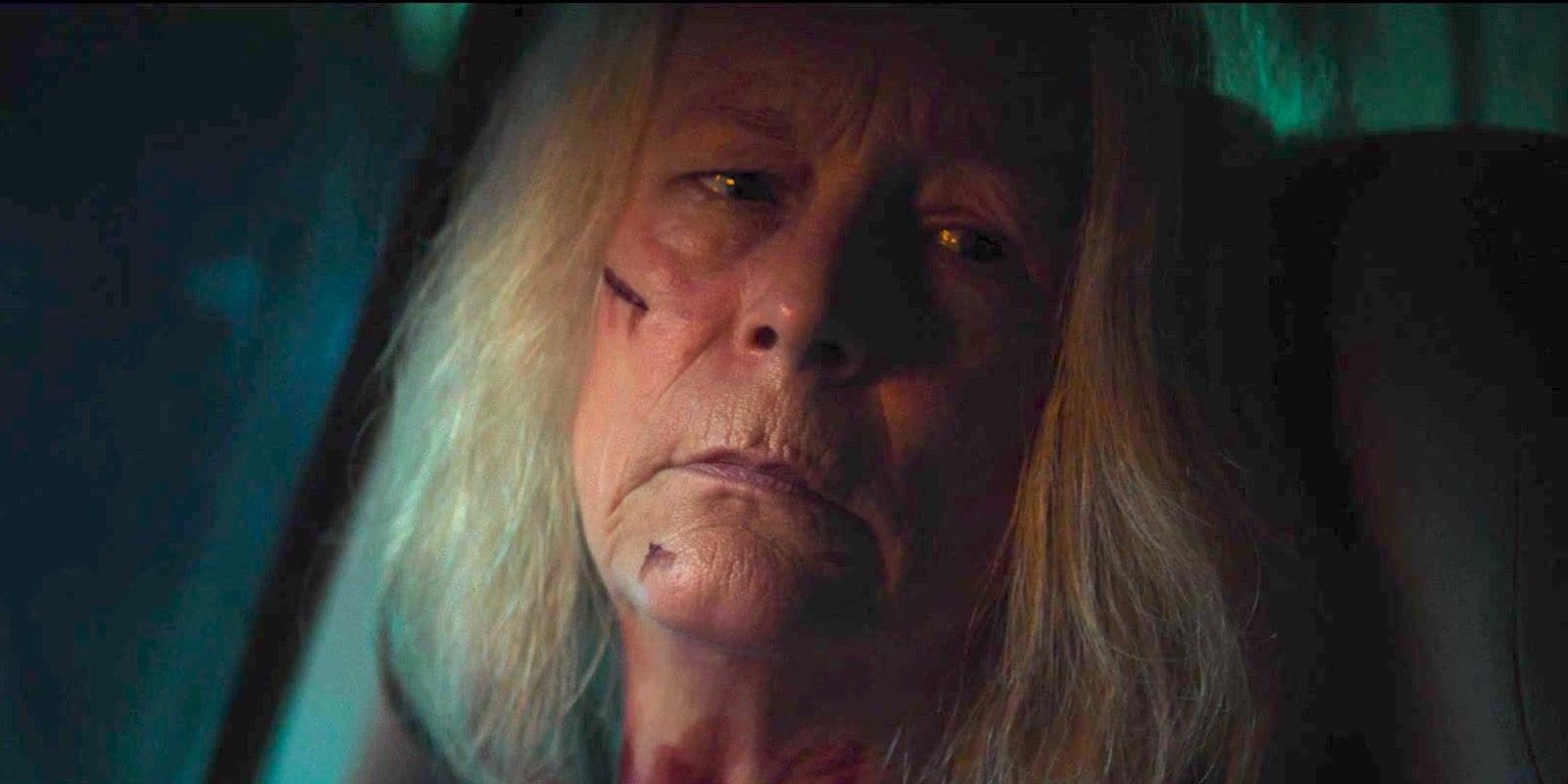 Jamie Lee Curtis as Laurie Strode in Halloween Ends with cut on her face