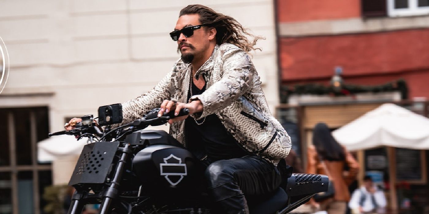 Jason Momoa rides a motorcycle in Fast X.