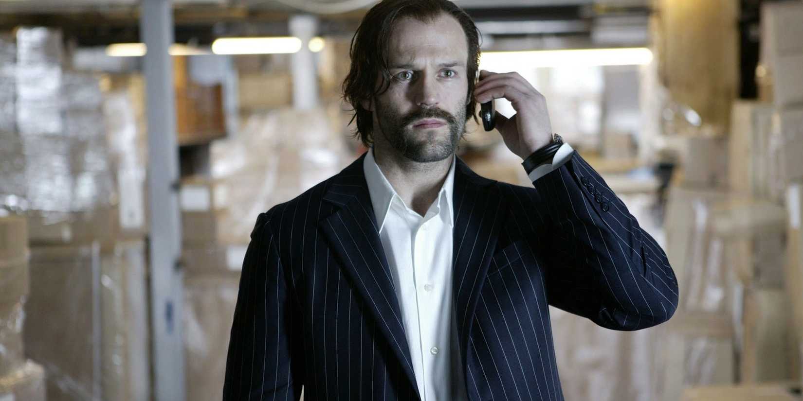 Jason Statham on the phone in Revolver