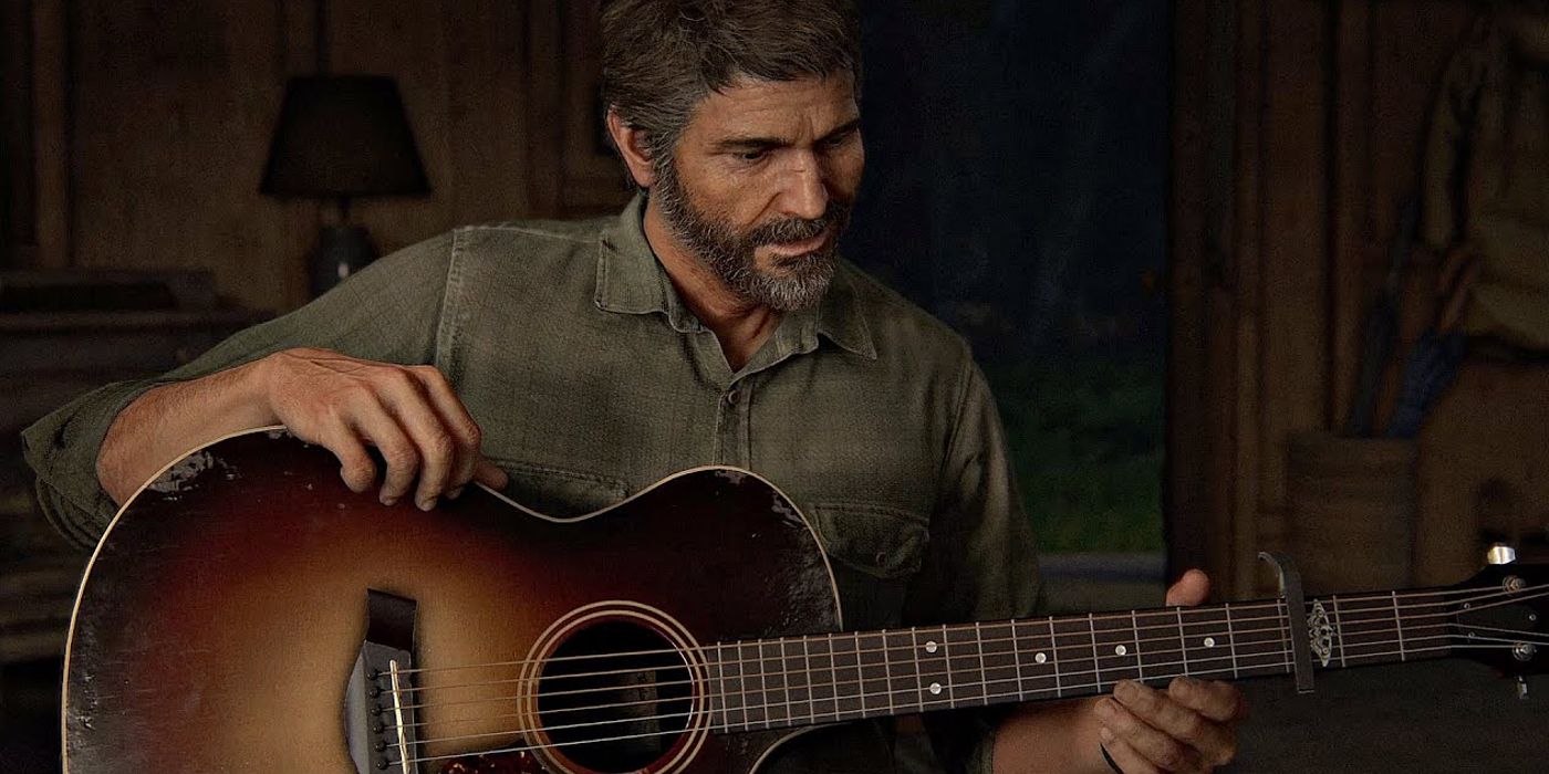 Joel segurando seu violão antes de cantar para Ellie em The Last of Us Part II
