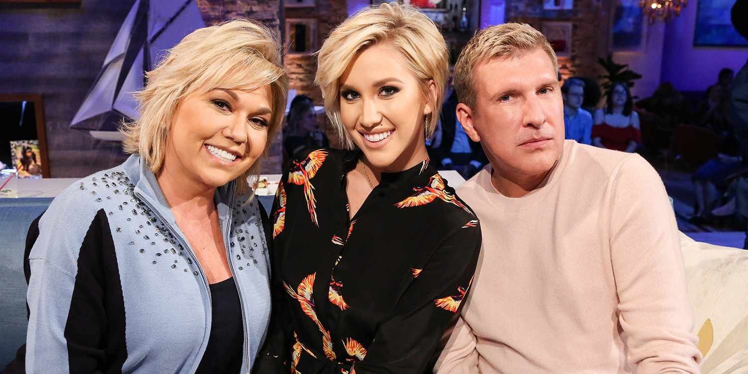 Todd and Julie Chrisley from Chrisley Knows Best pose with their daughter Savannah Chrisley