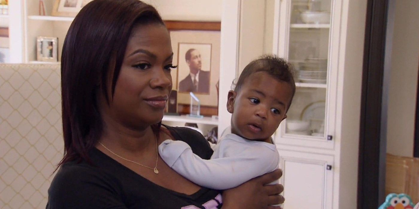 Kandi holding her baby on RHOA