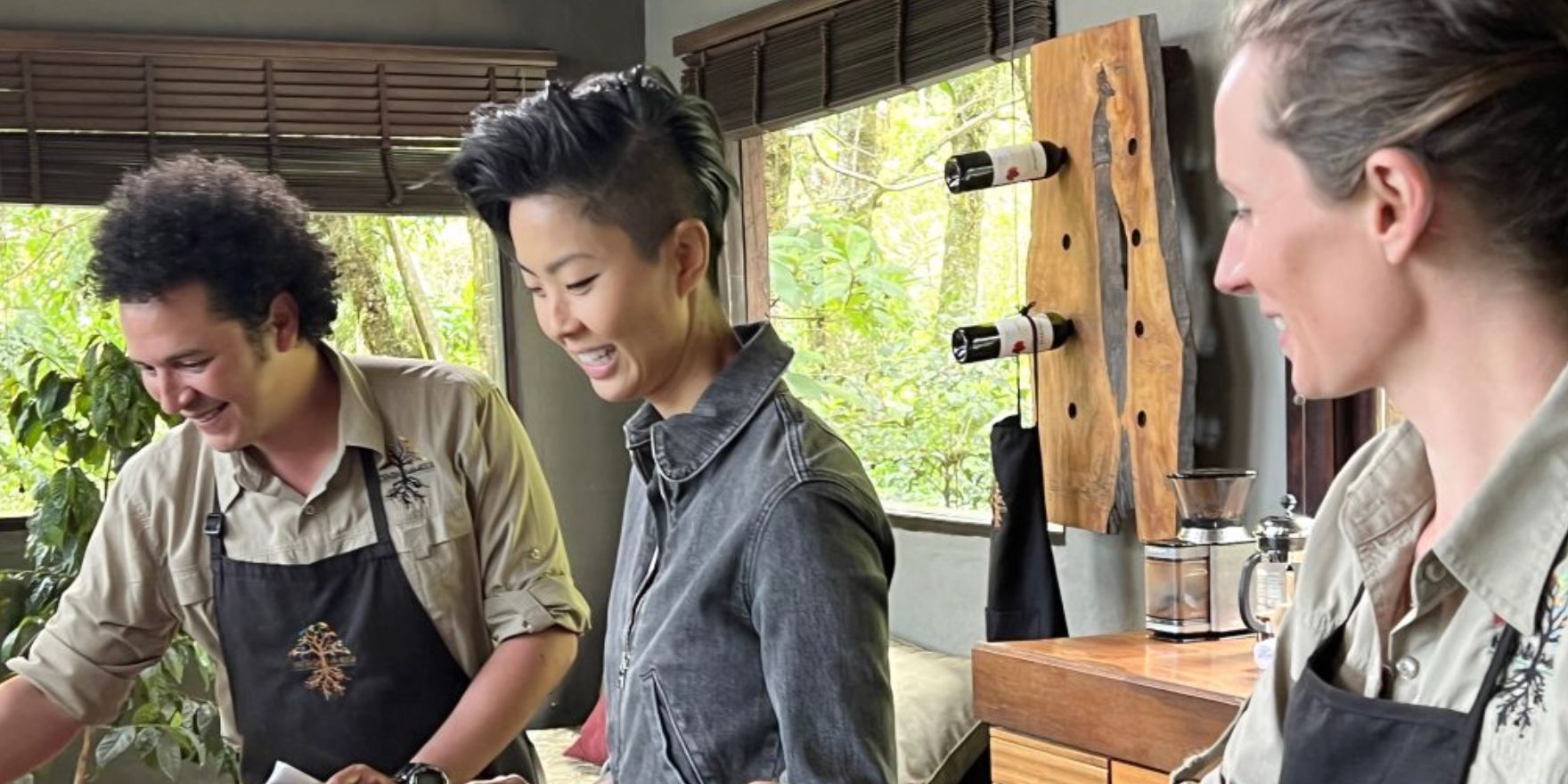 Kristen Kish in the kitchen with two chefs in Restaurants at the End of the World