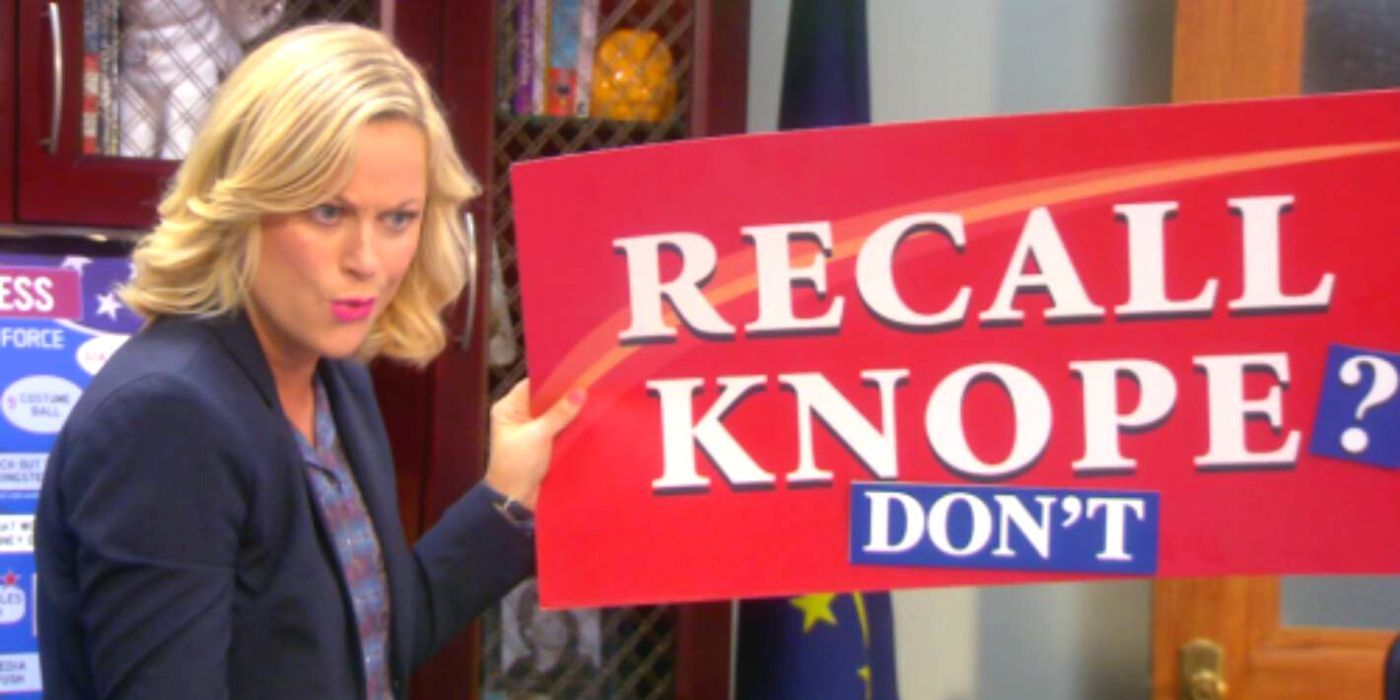 Leslie holding up a recall sign on Parks and Rec