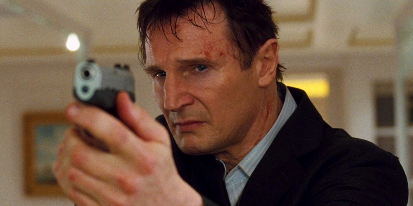 Liam Neeson pointing a gun in Taken.