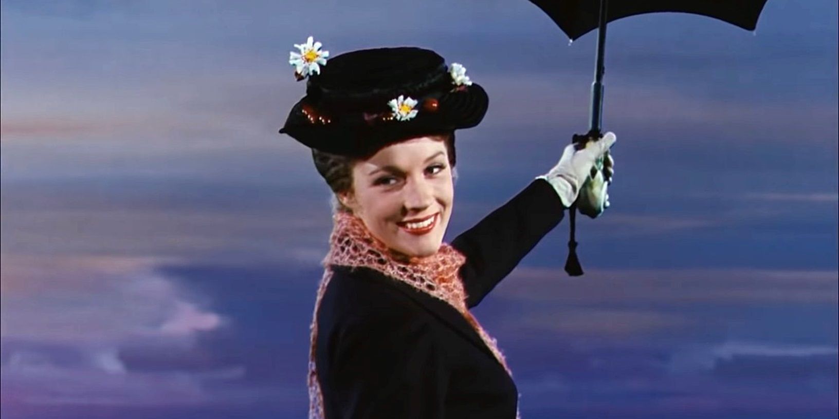 Julie Andrew's as Mary Poppins with a flying umbrella